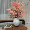 Astoria-Vase mit rosa Blütenzweige