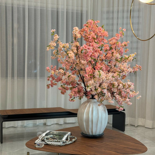 Astoria-Vase mit rosa Blütenzweige