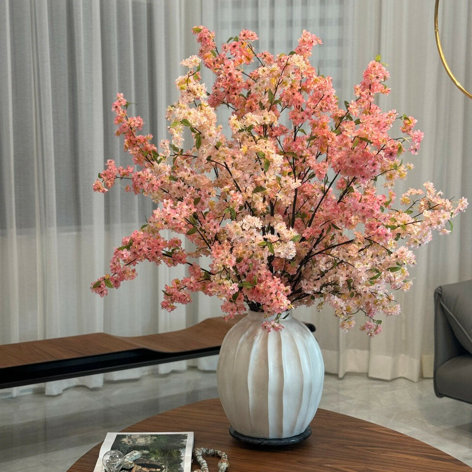Astoria-Vase mit rosa Blütenzweige